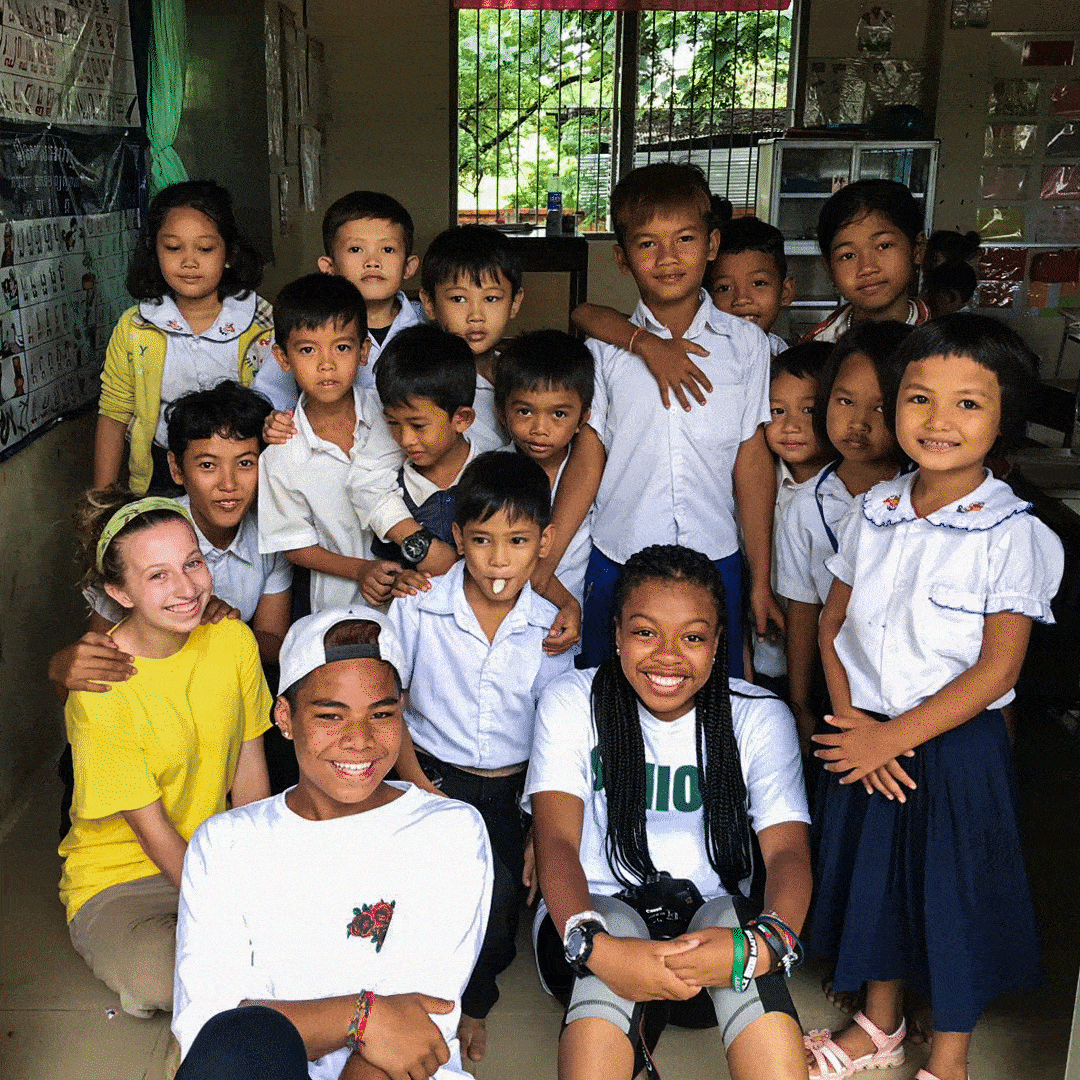 community service programs include work with children group of kids in Cambodia VISIONS Service Adventures
