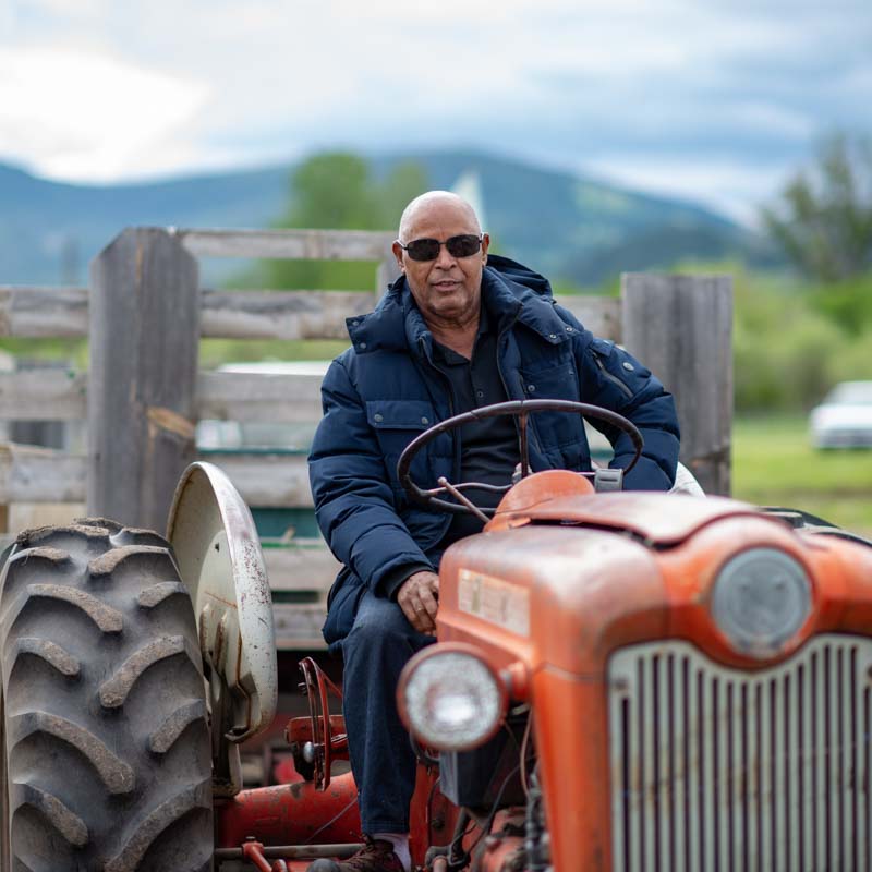 Santos Ramos sitting in a tractor in Montana