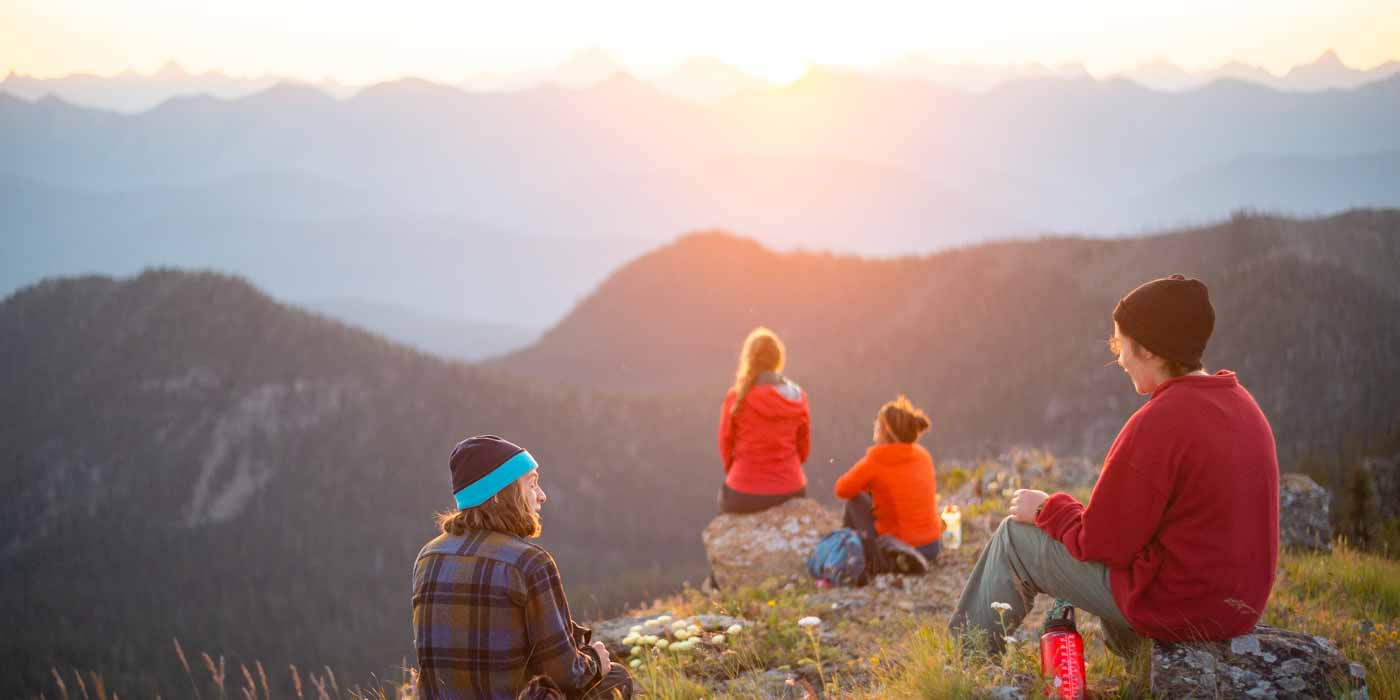 Teen volunteers watching the sunrise