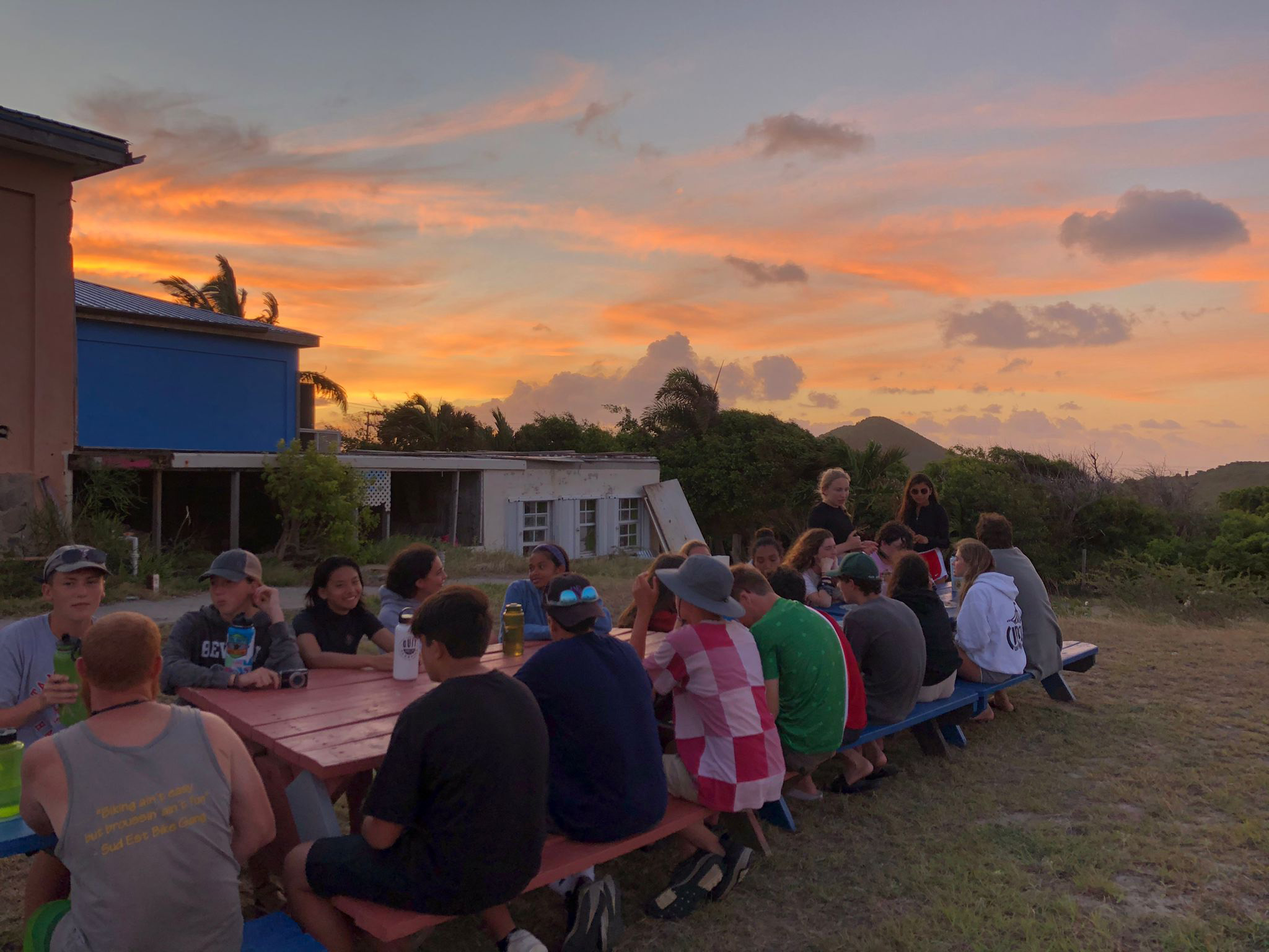 VISIONS BVI, Participants gathered for dinner during sunset.