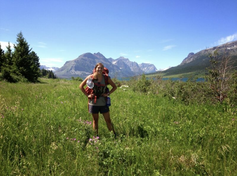 Nolan in a meadow at Glacier National Park