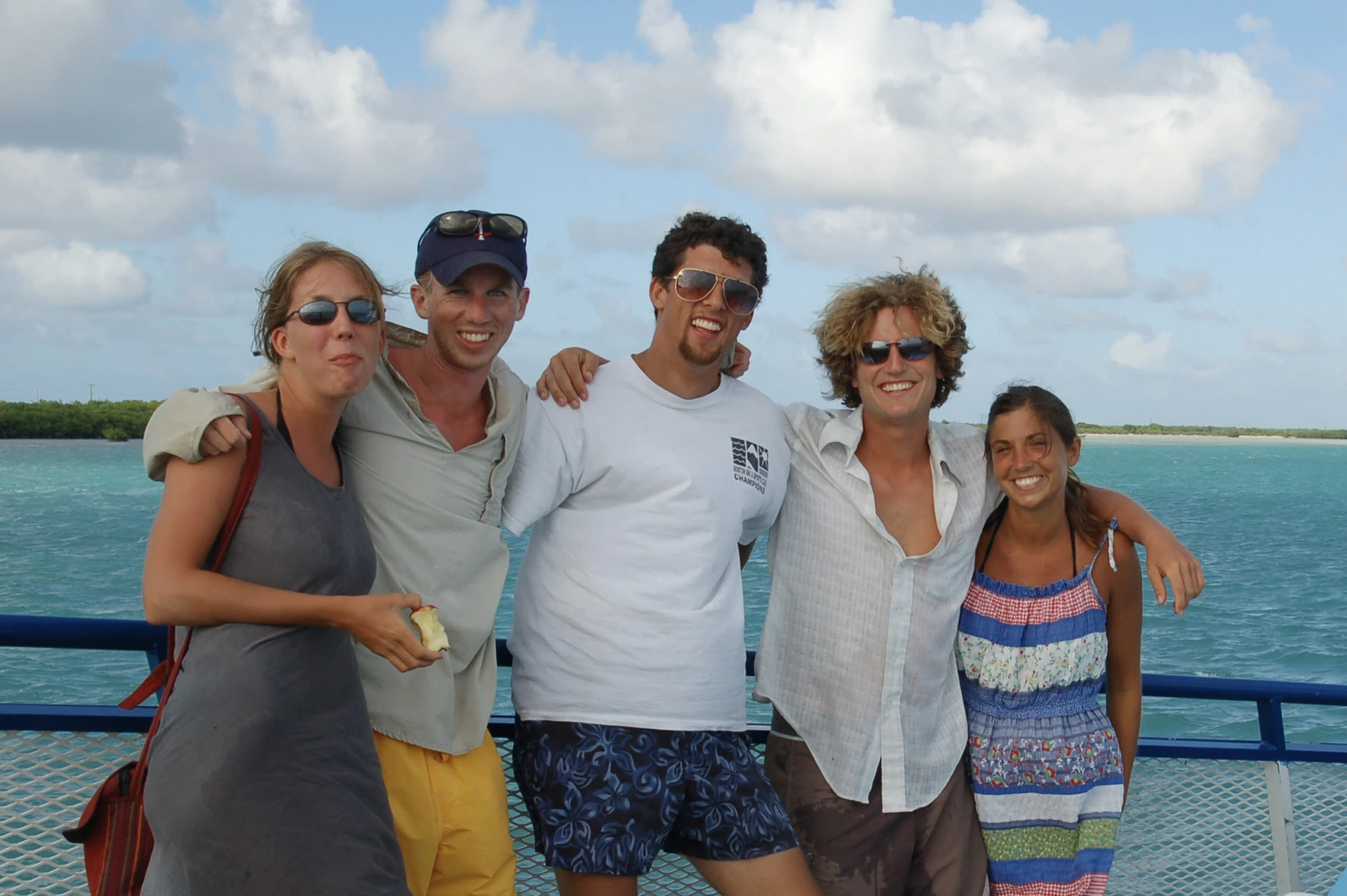 VISIONS summer leaders pose on a boat in the BVI