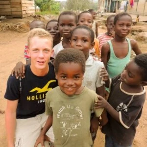 Andrew Goodrum with local kids at VISIONS community programs