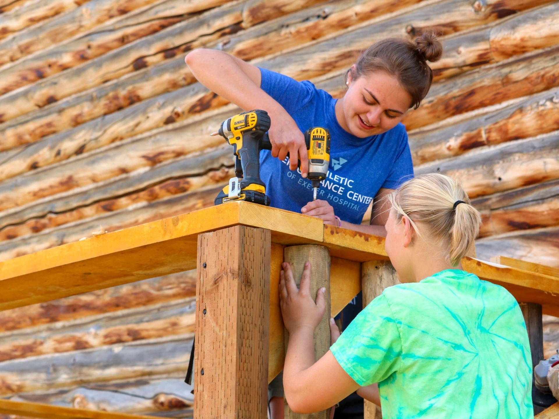 7 Questions to Ask When Choosing Summer Programs visions service adventures girls assembling porch