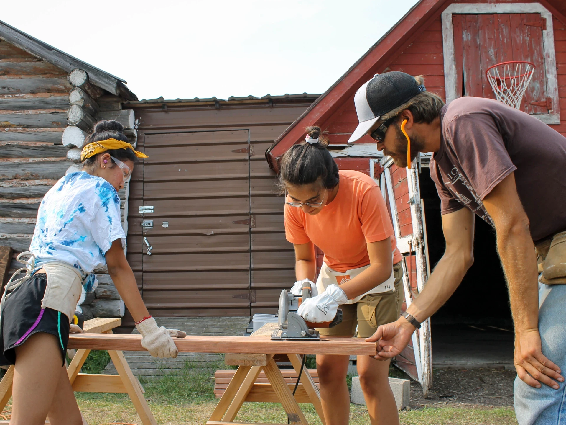 7 Questions to Ask When Choosing Summer Programs visions service adventures cutting wood in montana