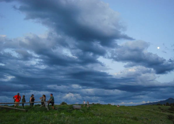 Visions leaders from around the world hike at dusk in Montana