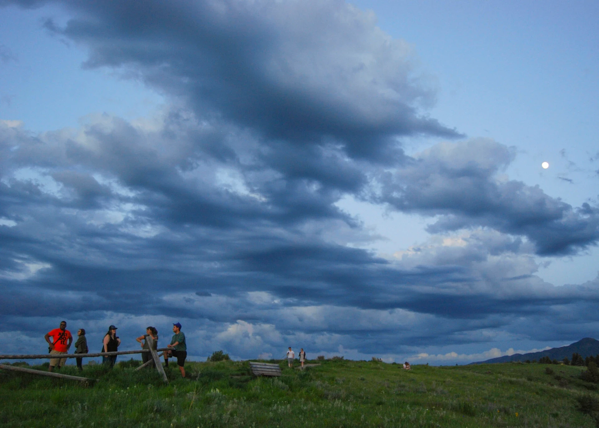Visions leaders from around the world hike at dusk in Montana