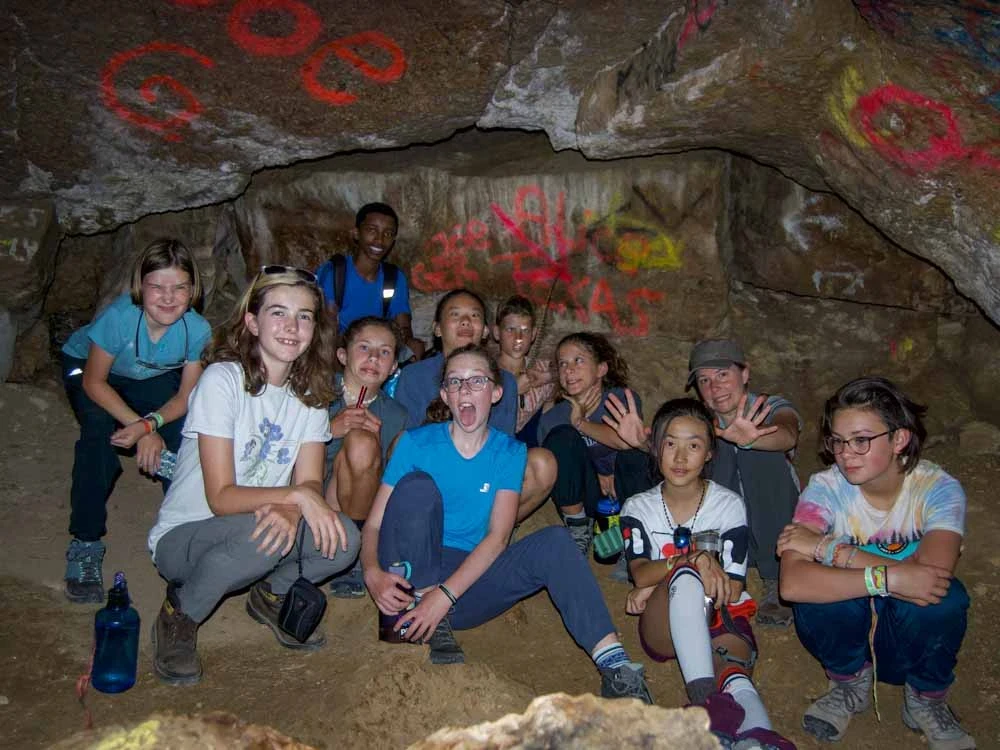 Middle schoolers explore caves in Montana.