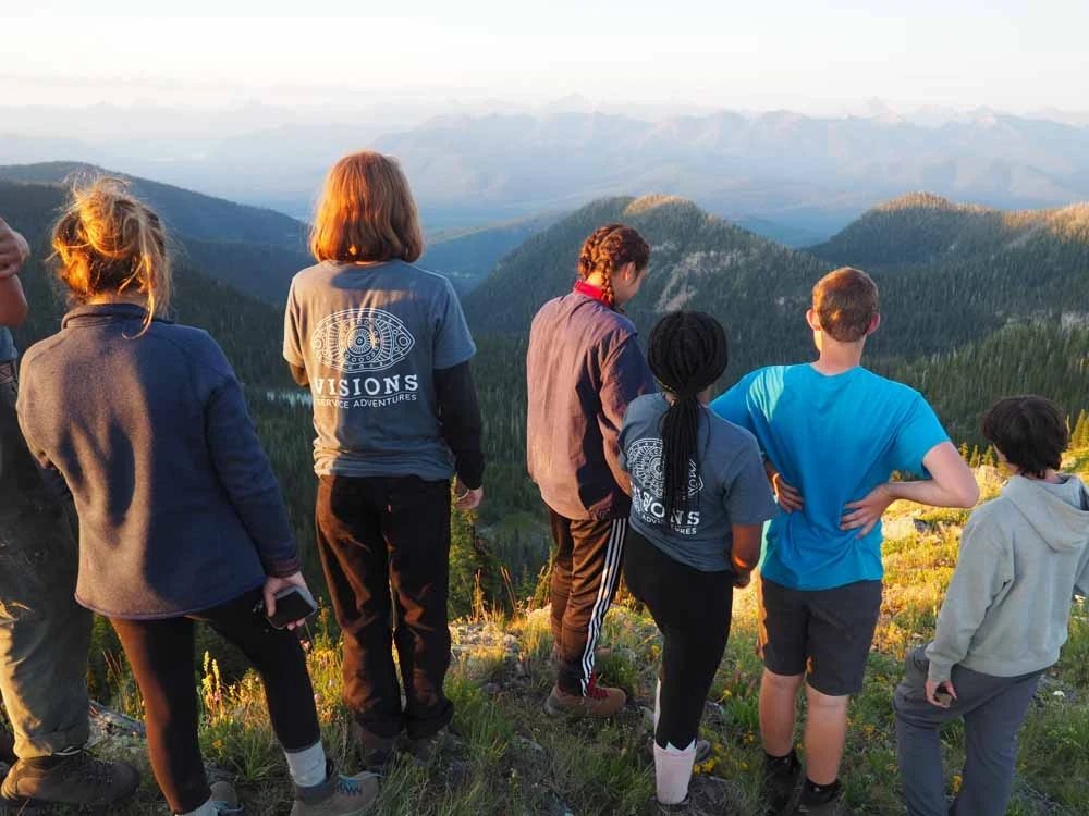 VISIONS teen volunteers enjoy a vista of Montana mountains near Glacier National Park.