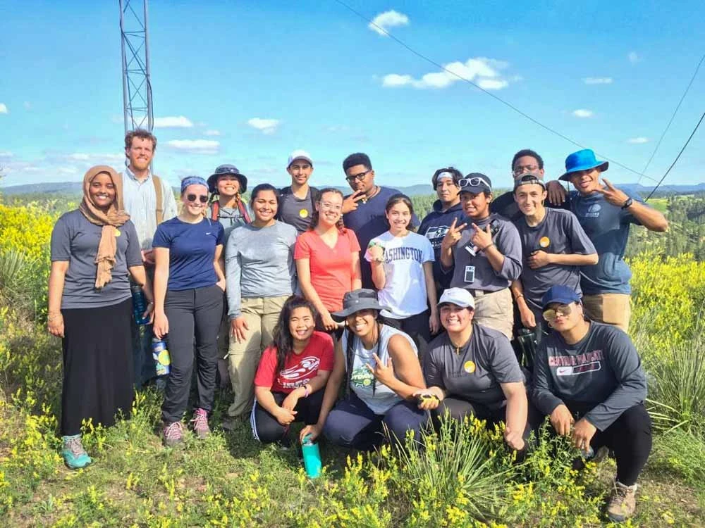 A diverse group of students posing in Montana during their VISIONS service trip in Montana.