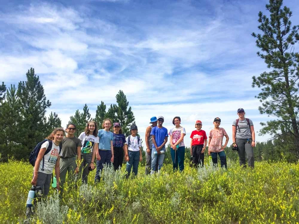 Students hiking in Montana on their middle school summer service trip.