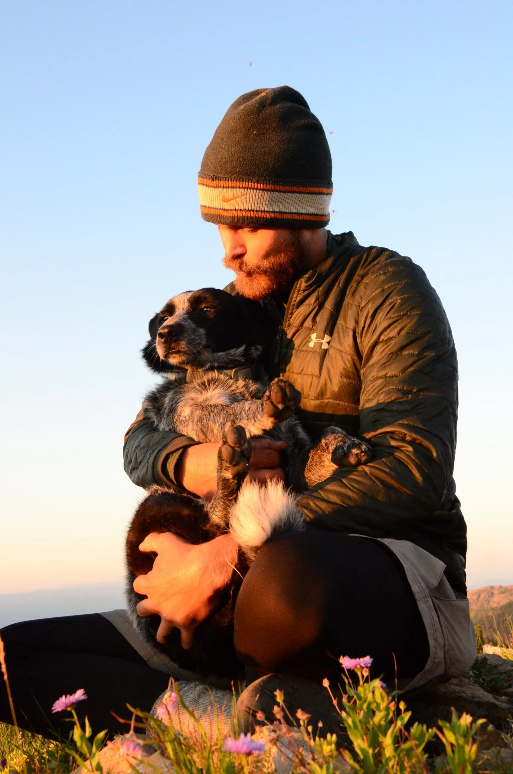 VISIONS leader and local dog enjoying the sunset