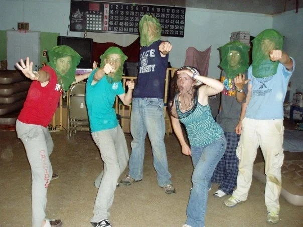 VISIONS participants with mosquito head nets