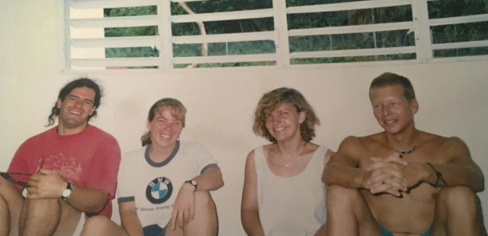 Multigenerational community british virgin islands tortola four people sitting on the floor