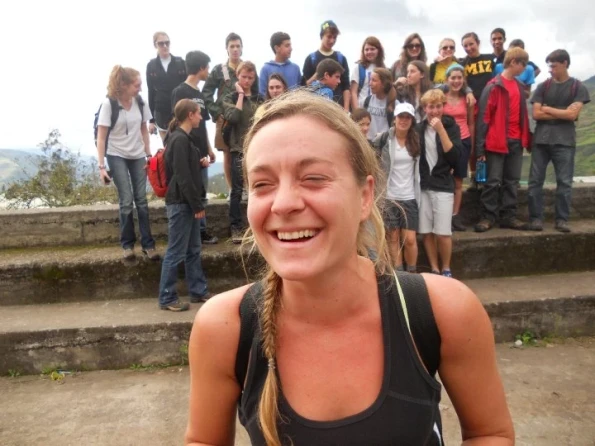 Anni, a VISIONS summer leader alum, stands in front of her teen volunteers as they wait to take a group photo, ca. 2005
