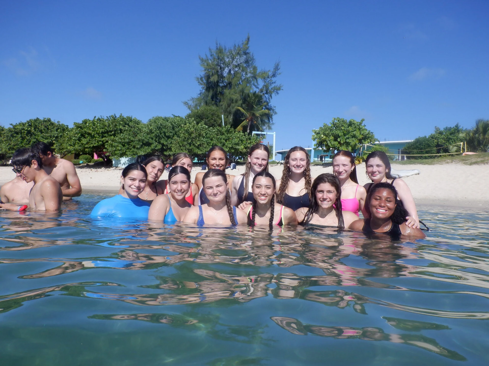 Group of teen volunteers in the ocean in the BVI